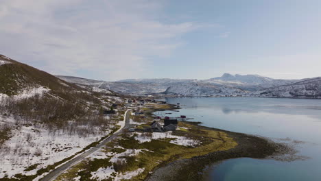 Aerial-view-of-scenic-ocean-drive-in-Daafjord,-Ringvassoya,-Norway