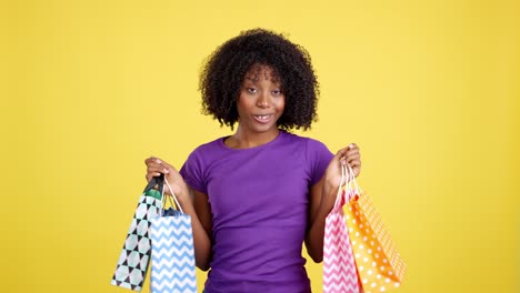 woman with shopping bags showing various emotions