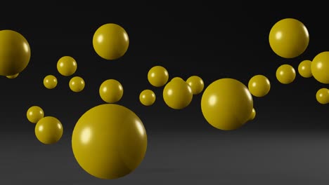 yellow balls on a black background. simple motion graphic seamless loop animation