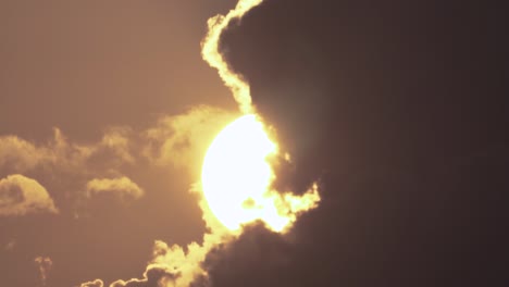 timelapse of sun behind clouds during sunset sunrise