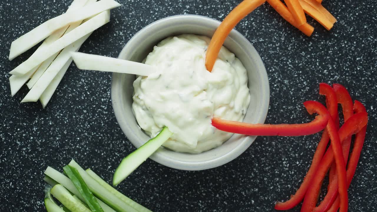 Vegetable sticks and dips in bowl. Healthy vegetables and dip snack.