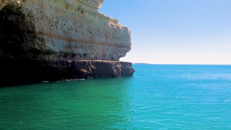 A-4K-reveal-shot-of-the-Portugal-Algarve-Coast-and-Cliffs-Looking-west-towards-Vilamoura