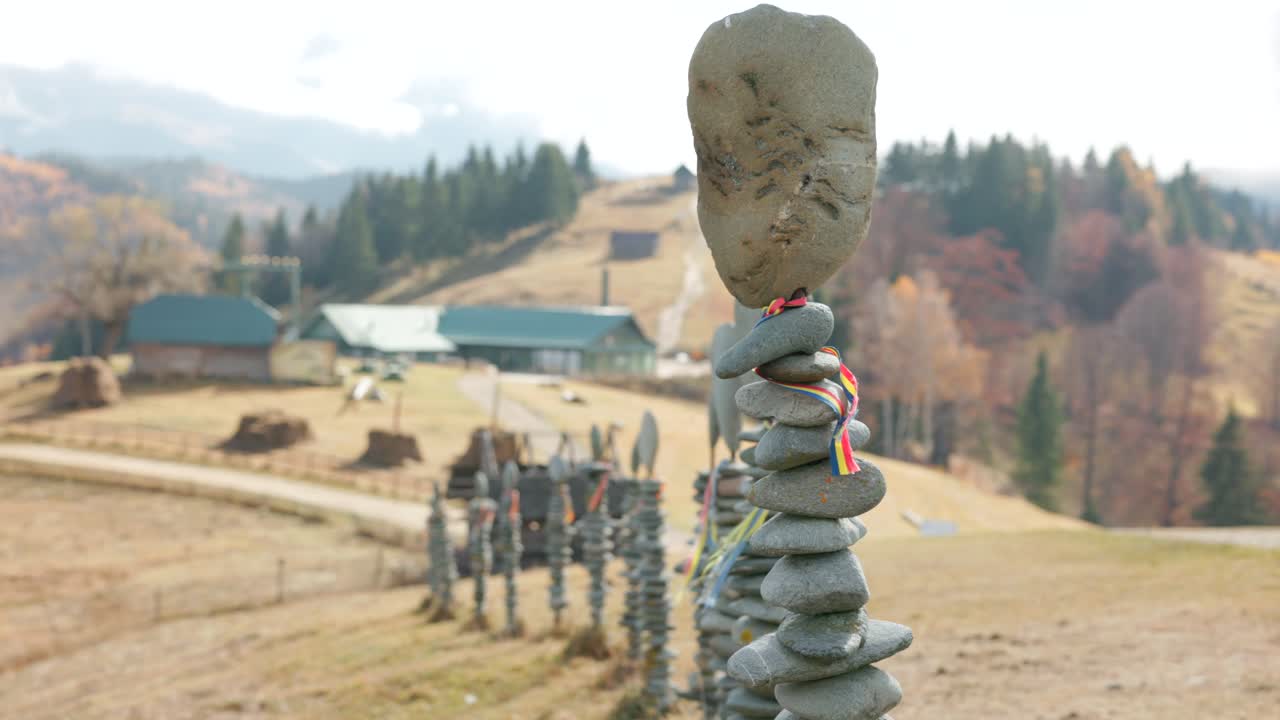 Stone Cairn At The Amfiteatrul Transilvania, Outdoor Cultural Venue And Ecological Complex In Rucăr-Bran Of Romania. Static Shot