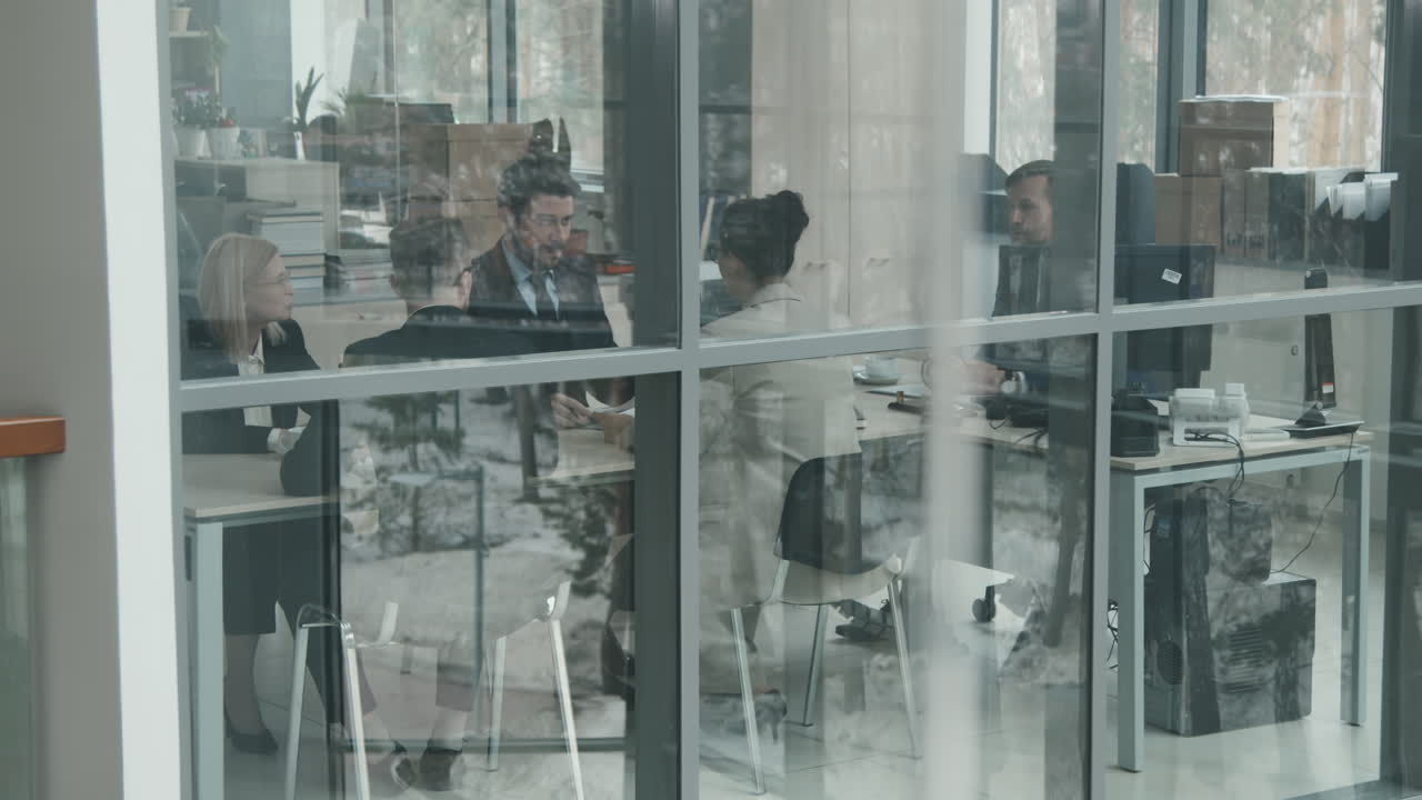 Professional Lawyers Having Conference in Office