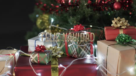 Texto-De-Feliz-Navidad-Sobre-Regalos-Navideños,-Luces-Y-árboles.