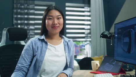 woman working on computer in home office