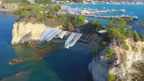 aerial drone view video of famous islet of cameo in agios sostis area of laganas, zakynthos island, ionian greece