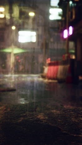 wet sidewalk on asian city street at night