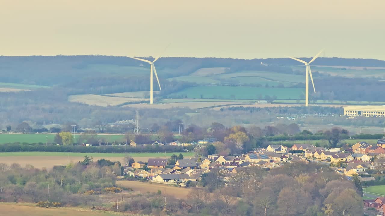Park Spring Wind Farm turbines rise above fields north-east of Netherwood Country Park, Wombwell, Barnsley—vivid symbols of South Yorkshire’s renewable energy transition, dron e statif shot
