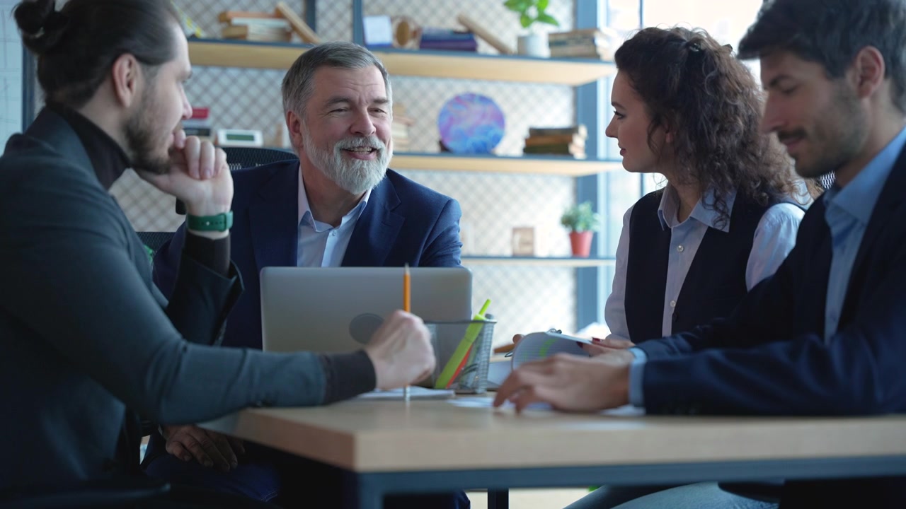 Diverse Business Team Collaborating in a Modern Office Meeting