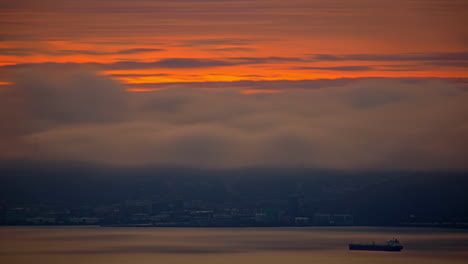 heavy fog over the san francisco bay at sunrise - time lapse