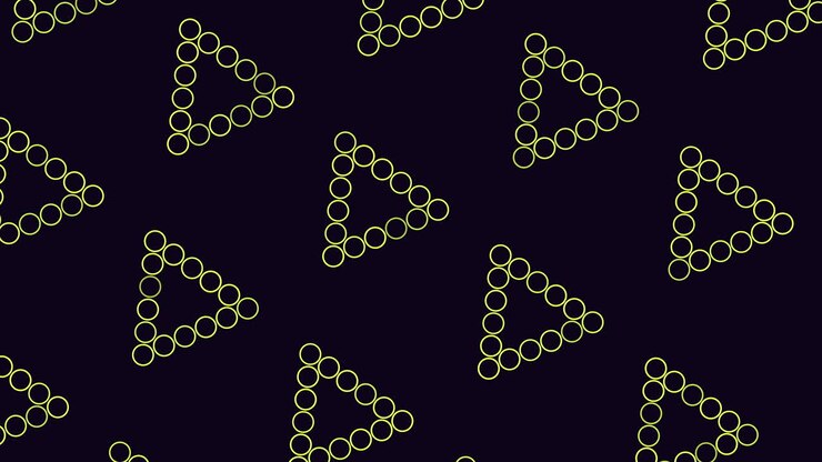 Blue dot triangle pattern on black background repeated pattern creates striking image