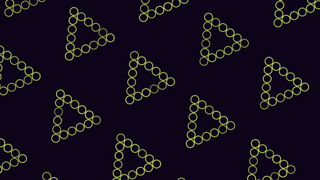 Blue dot triangle pattern on black background repeated pattern creates striking image