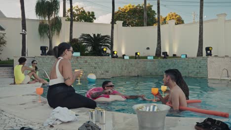 friends enjoying a summer pool party