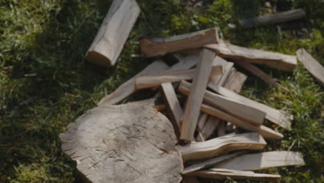 chopping wooden log with an axe
