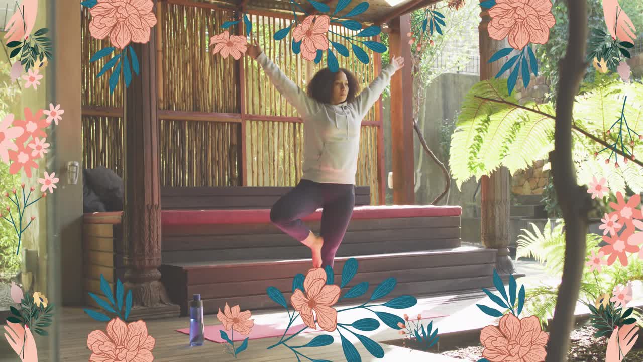 animación de iconos de flores sobre una mujer afroamericana practicando yoga