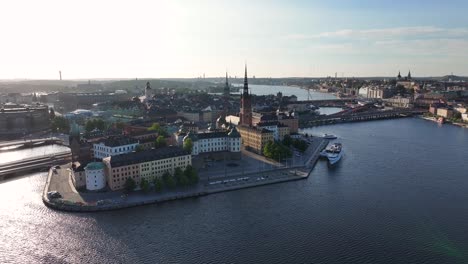 Beautiful-aerial-of-Riddarholmen,-Gamla-Stan,-historic-old-town,-tourist-attraction-and-historic-landmark