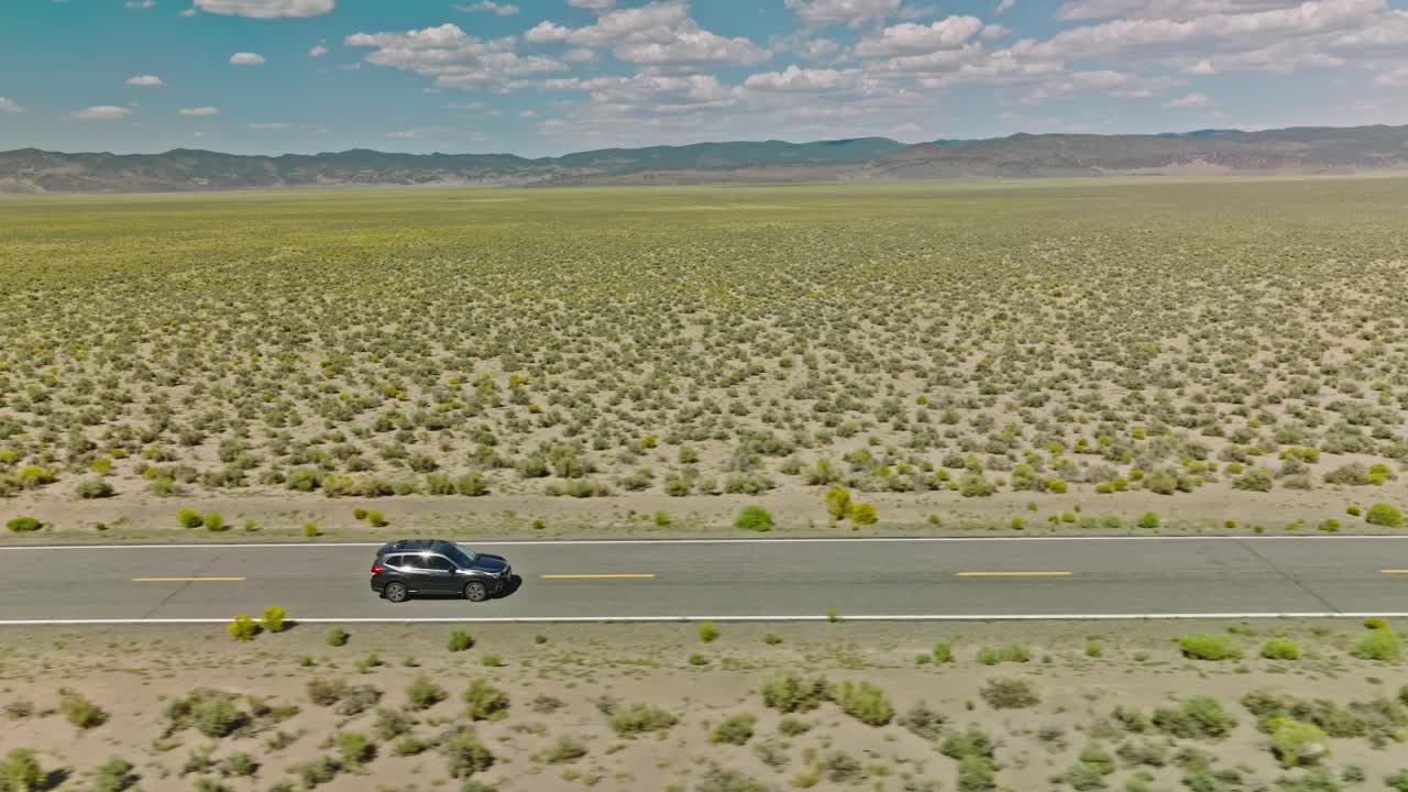 Car driving along road on American road trip with beautiful smooth