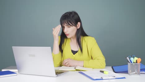 woman sending wrong mail on laptop. can't get mail back.