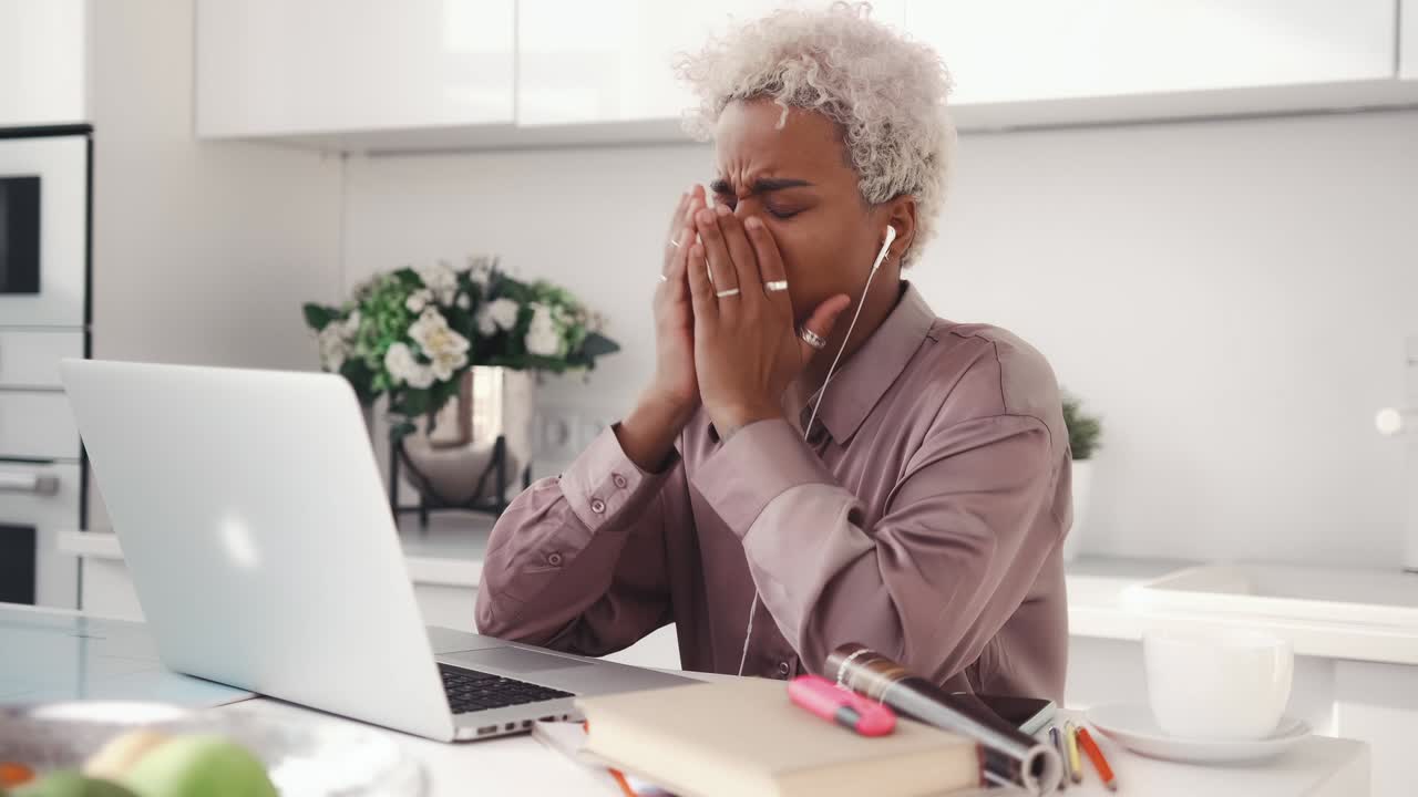 Annoyed african american woman worry about problems with laptop got bad news