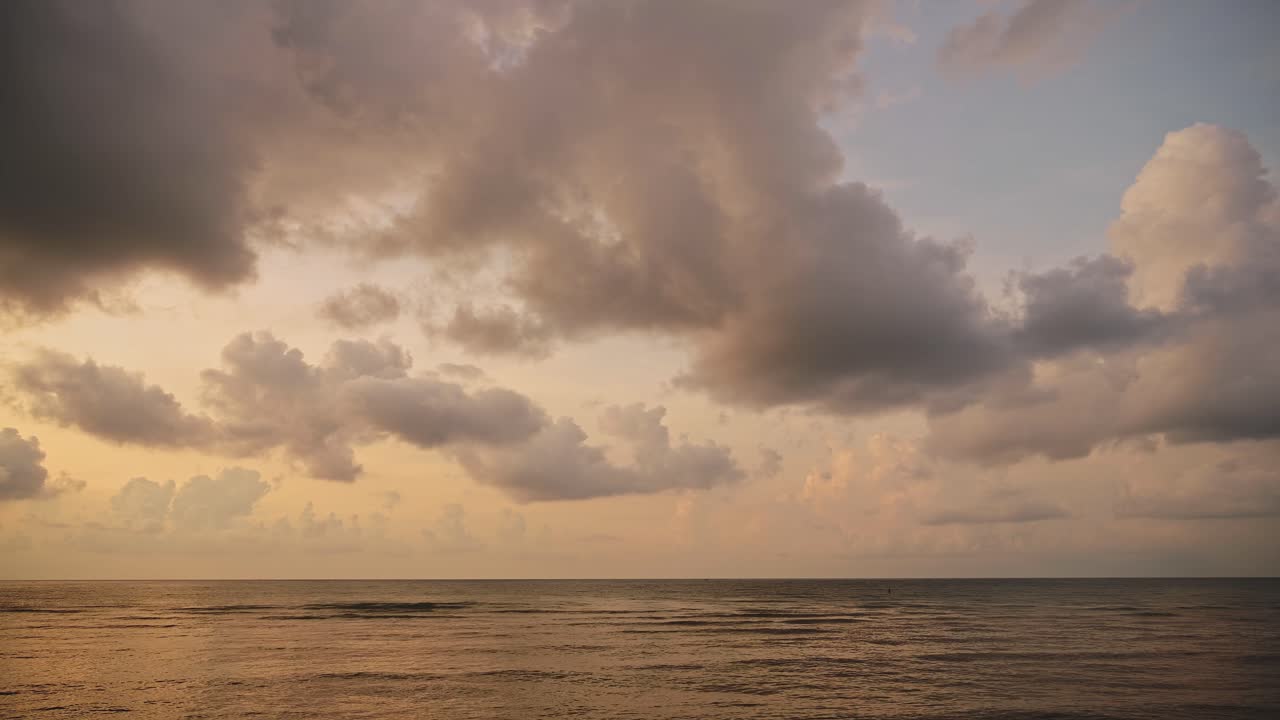 Dramatic Sky Orange Sunset Clouds, Horizon and Sea Ocean Background with Copyspace, Big Stormy Sky and Storm Clouds at Lamai Beach on Koh Samui Tropical Island, South Thailand