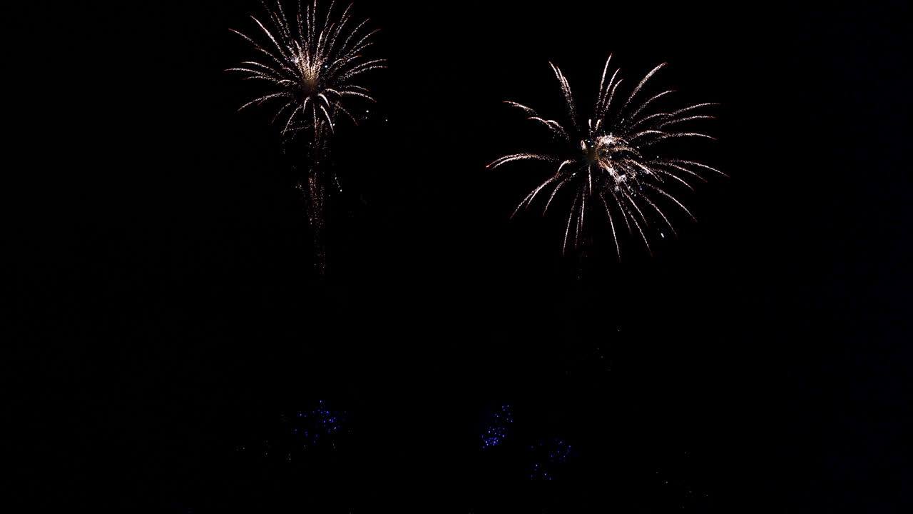 Smudges of light turn into brightly colored fireworks