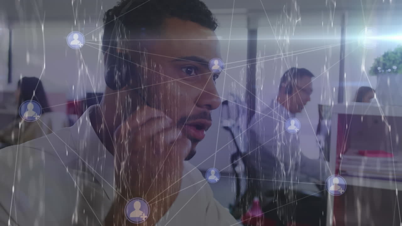 Animation of network and people icons over happy african american businessman using headset