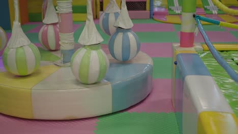 colorful play area with spinning balls