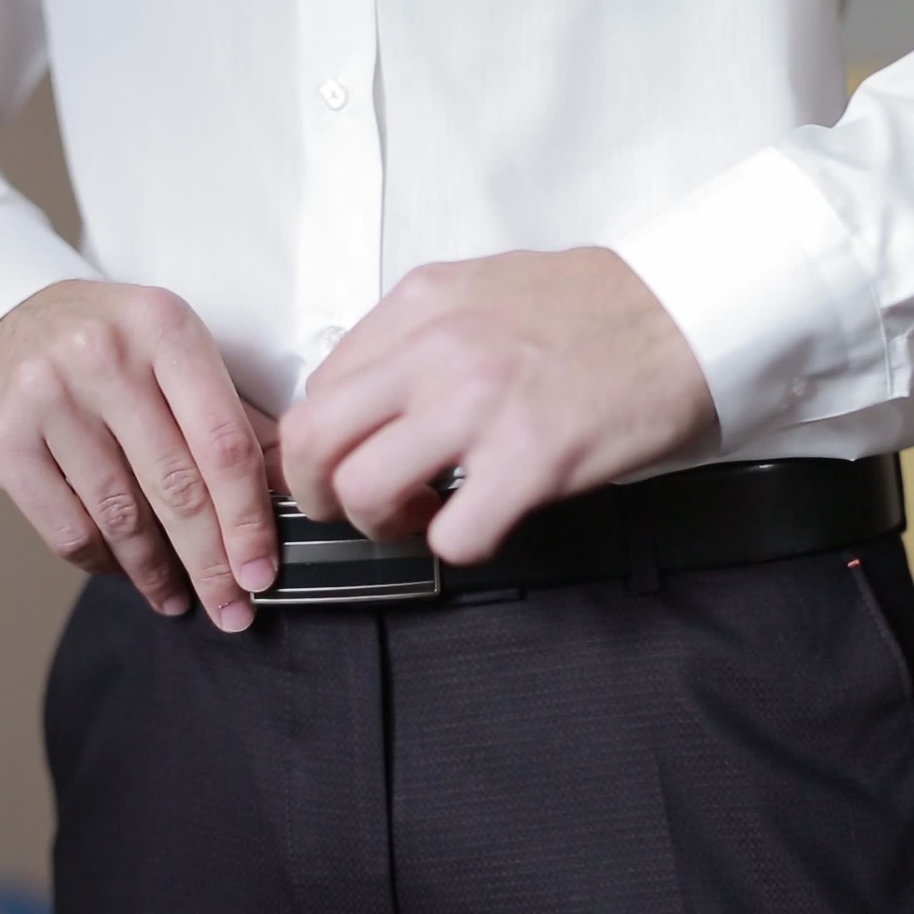 Elegant Groom Dressing Up In The Morning