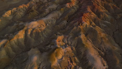 fly over ancient tsagaan suvarga during sunset in dundgovi, mongolia