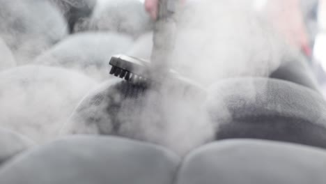 deep steam cleaning of upholstered sofa