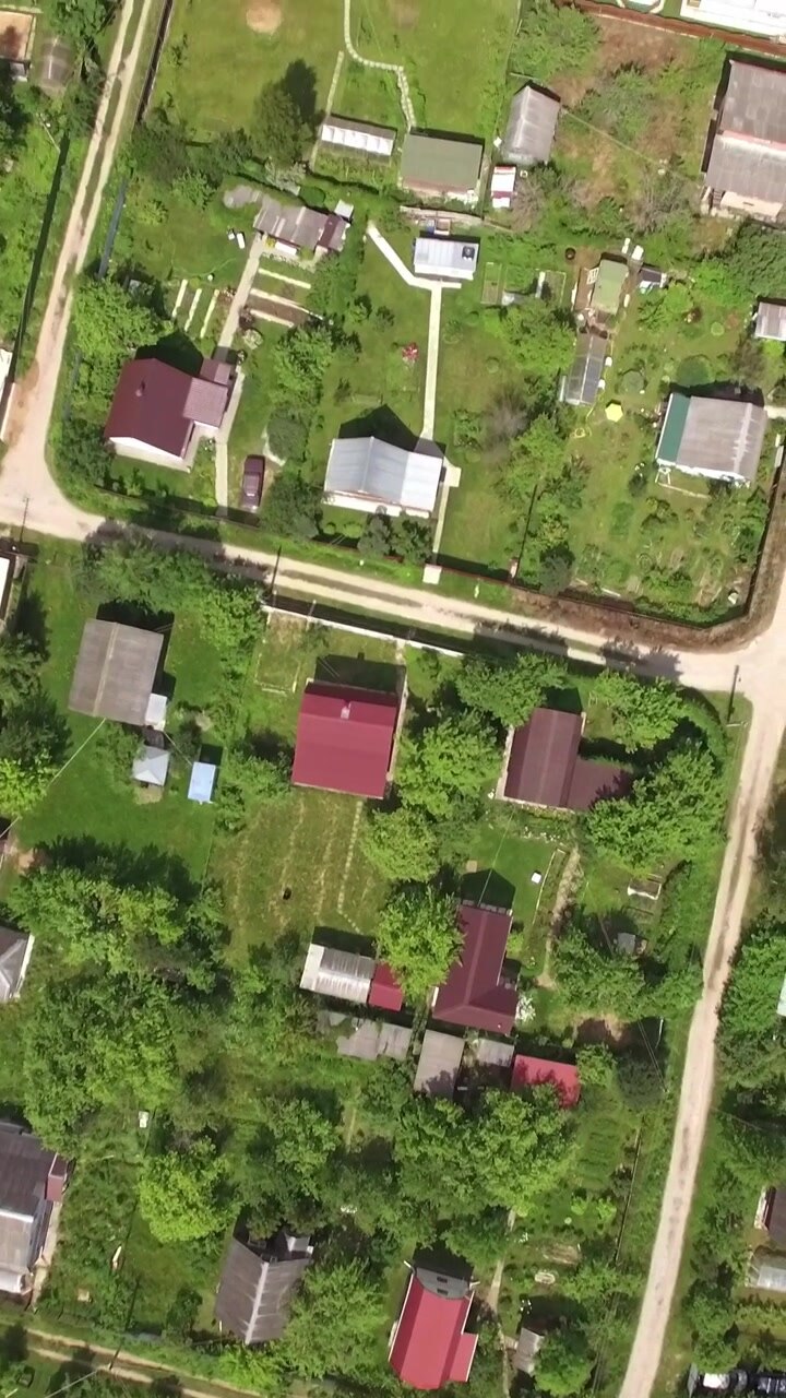 Top view of country houses in sun day at summer, Russia