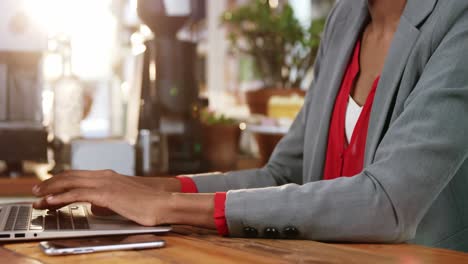 Woman-working-on-a-laptop