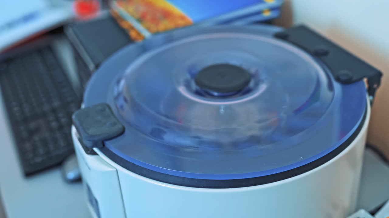 Modern technologies in medical equipment. Medical device centrifuge in process for mixing in the laboratory