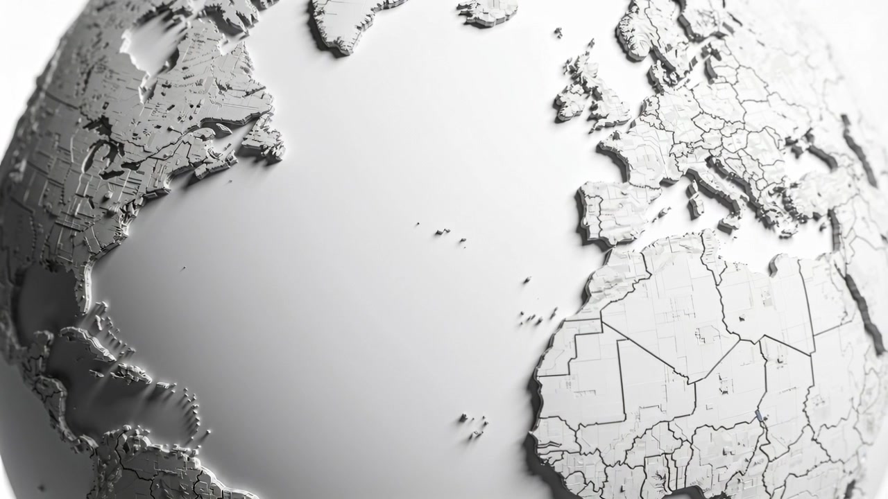 Playback starting, metallic globe rotating in studio, revealing engraved borders and island groups