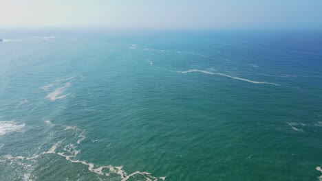 fly over sea surface with calm waves