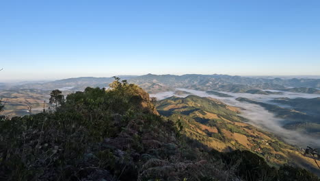 a dramatic panning view across the stunning pedra do bau mountain landscape of brazil