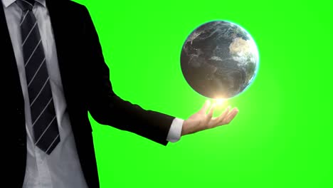 hombre de negocios con animación de globo en frente de la pantalla verde