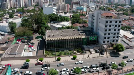 aerial point of interest shot around a street of goiania in brazil with a traffic jam