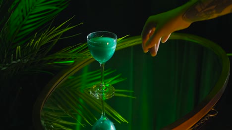 vibrant turquoise cocktail with tropical ambiance