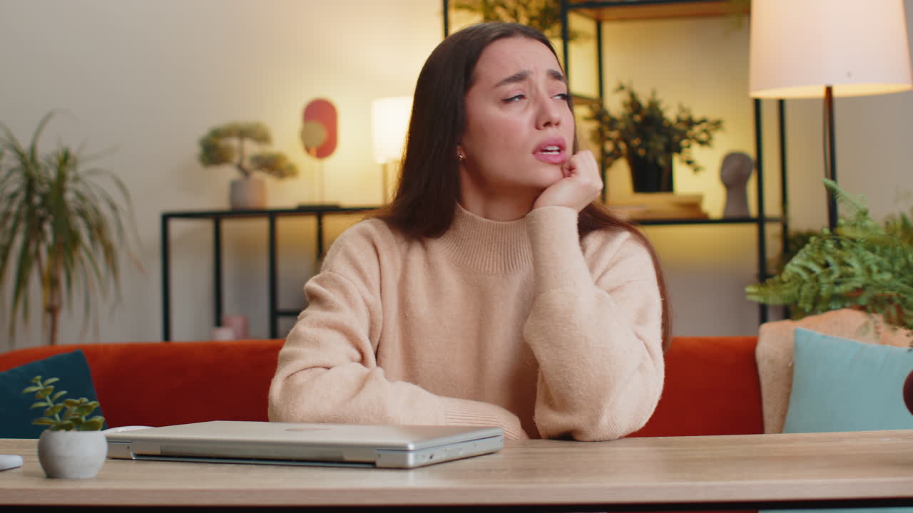 Angry caucasian woman use laptop surprised by bad news fortune loss game fail lottery result at home