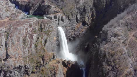 Drone-Aerial-View-of-Stunning-Waterfall-and-Steep-Rocky-Canyon-in-Rogaland-Nature-Preserve,-Norway