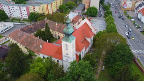 Saint-Martin's-Church-in-Szombathely,-Hungary-in-Aerial-approach-view