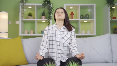 young woman meditating peaceful and calm.