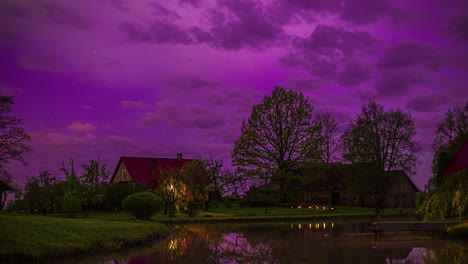 idyllic scene of houses near pond during dawn till dusk