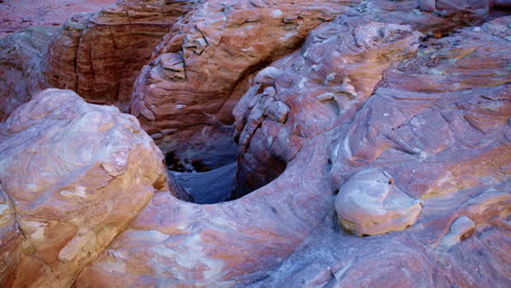 the camera circles the surreal desert landscape of glen canyon, emphasizing its dramatic erosion patterns.
