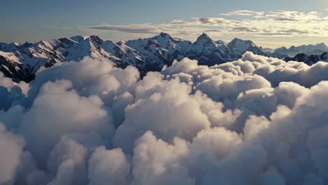 majestic mountain peaks pierced by clouds