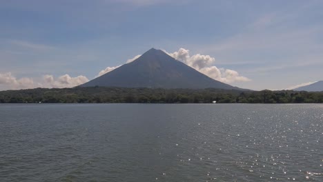 concepcion volcano on ometepe island, nicaragua, view from ferry boat sailing in lake
