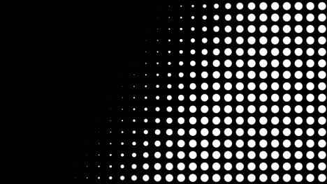 aparecen y desaparecen puntos blancos de medio tono sin costuras en movimiento en fondo negro. animación de patrón vintage