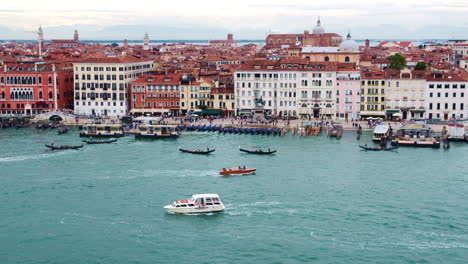 Aerial-shot-of-San-Marco,-Vence,-Italy-shoreline,-with-Hotel-Danieli-and-rio-dei-Greci